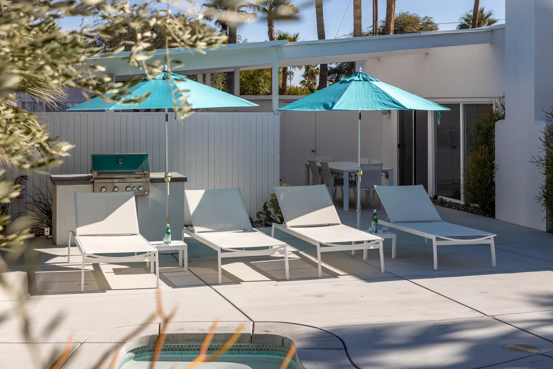 Shaded pool lounging chairs