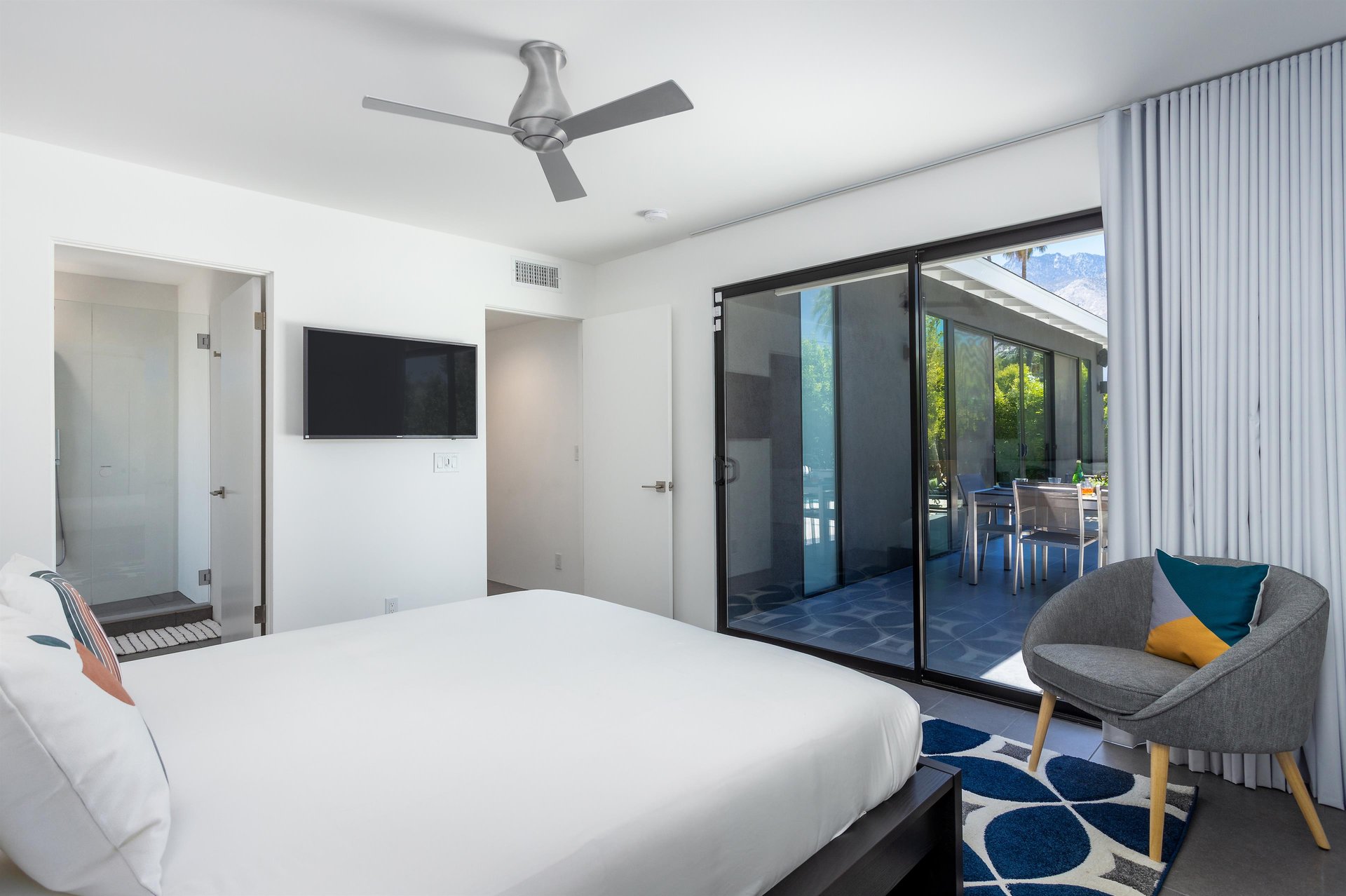 A gorgeous bedroom with outdoor access