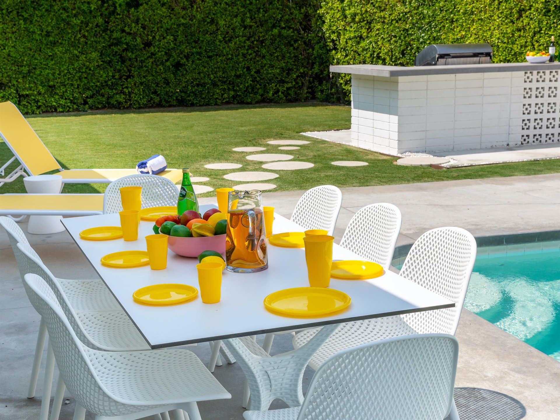 Alfresco dining by the pool for up to 8 guests