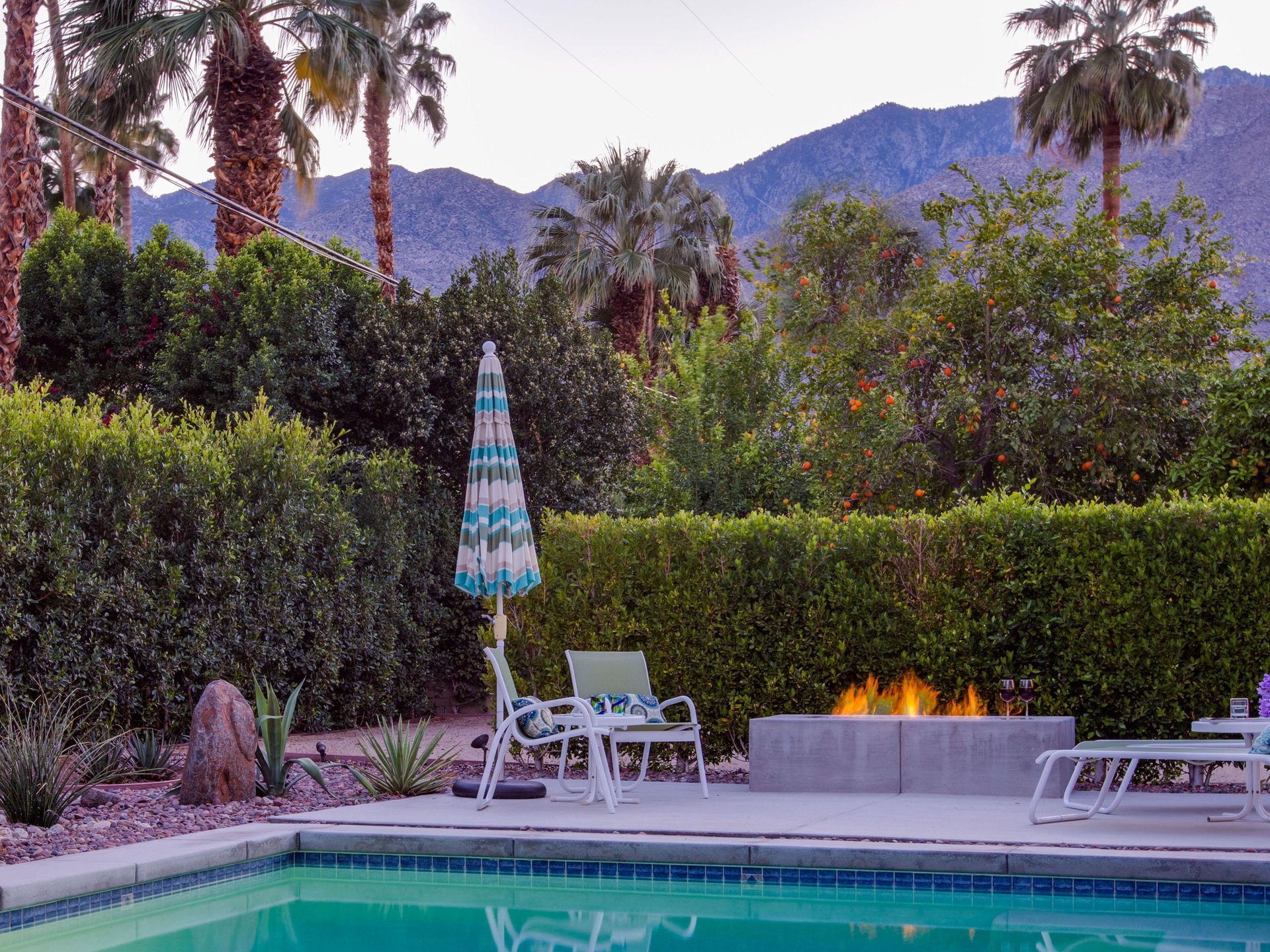 Enjoy a cozy fire by the pool
