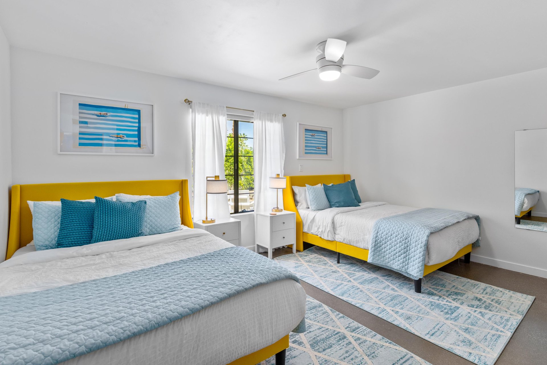 Guest bedroom with two queen beds