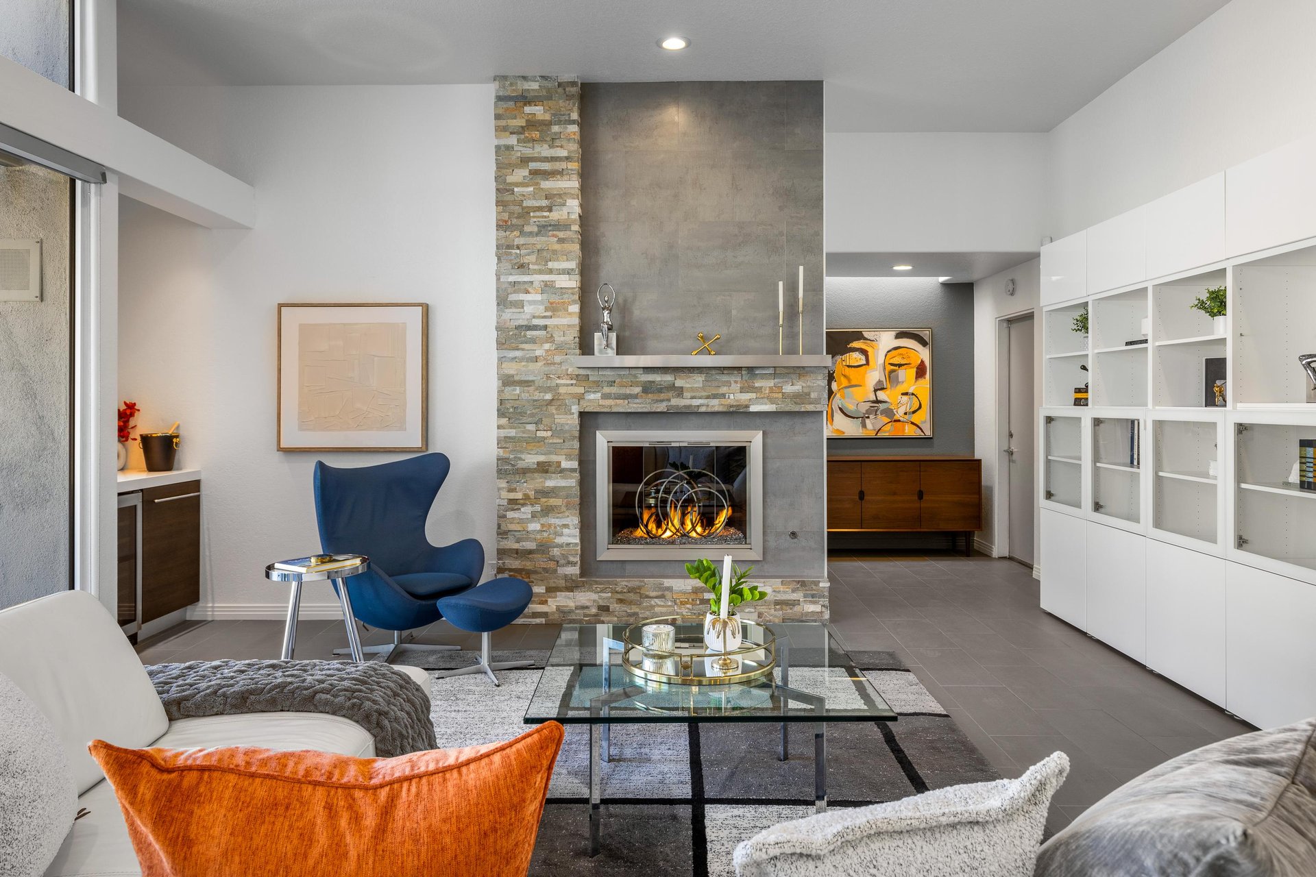 Enjoy a glass of wine around the fireplace