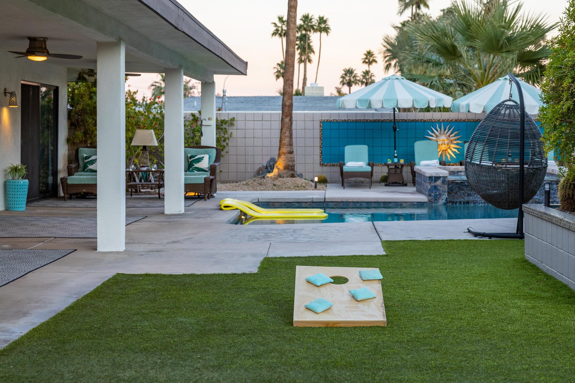 Play a game of cornhole