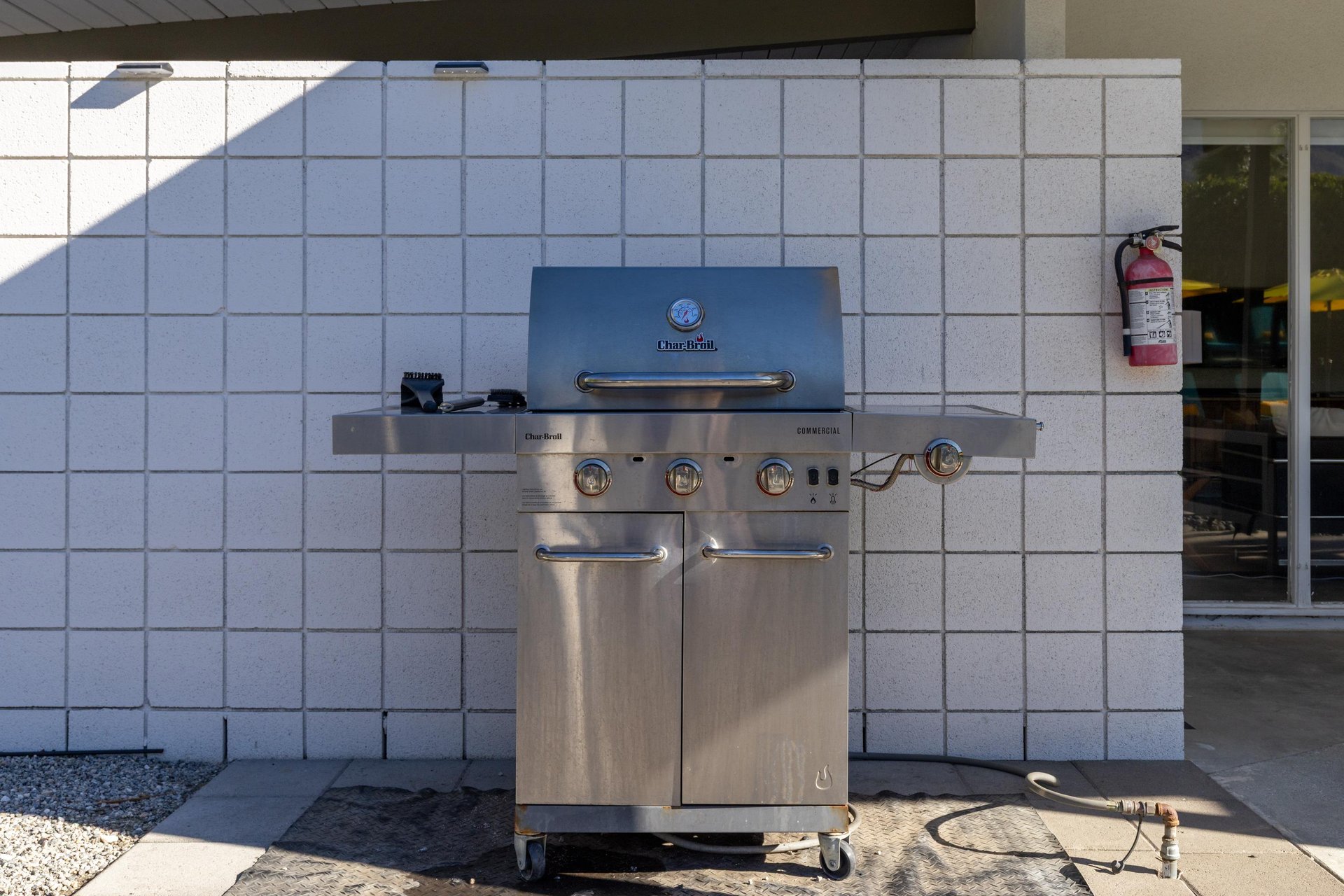 Fire up your culinary skills on this premium stainless steel grill, perfectly positioned for your outdoor cooking adventures.