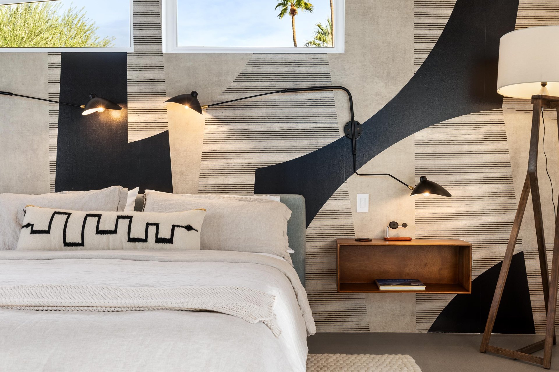 Rest in your stylish bedroom with crisp linens, warm lighting, and modern design touches creating the perfect retreat.