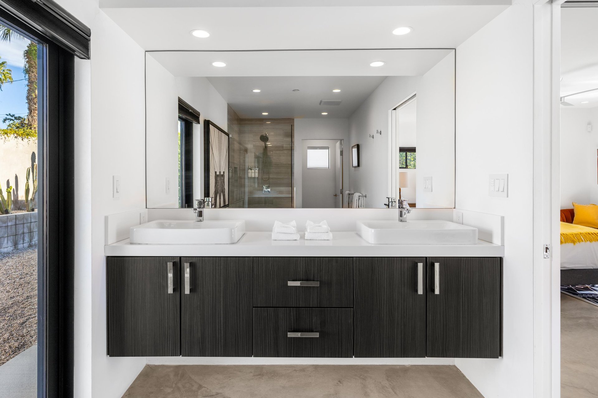 Primary bathroom with dual vanities