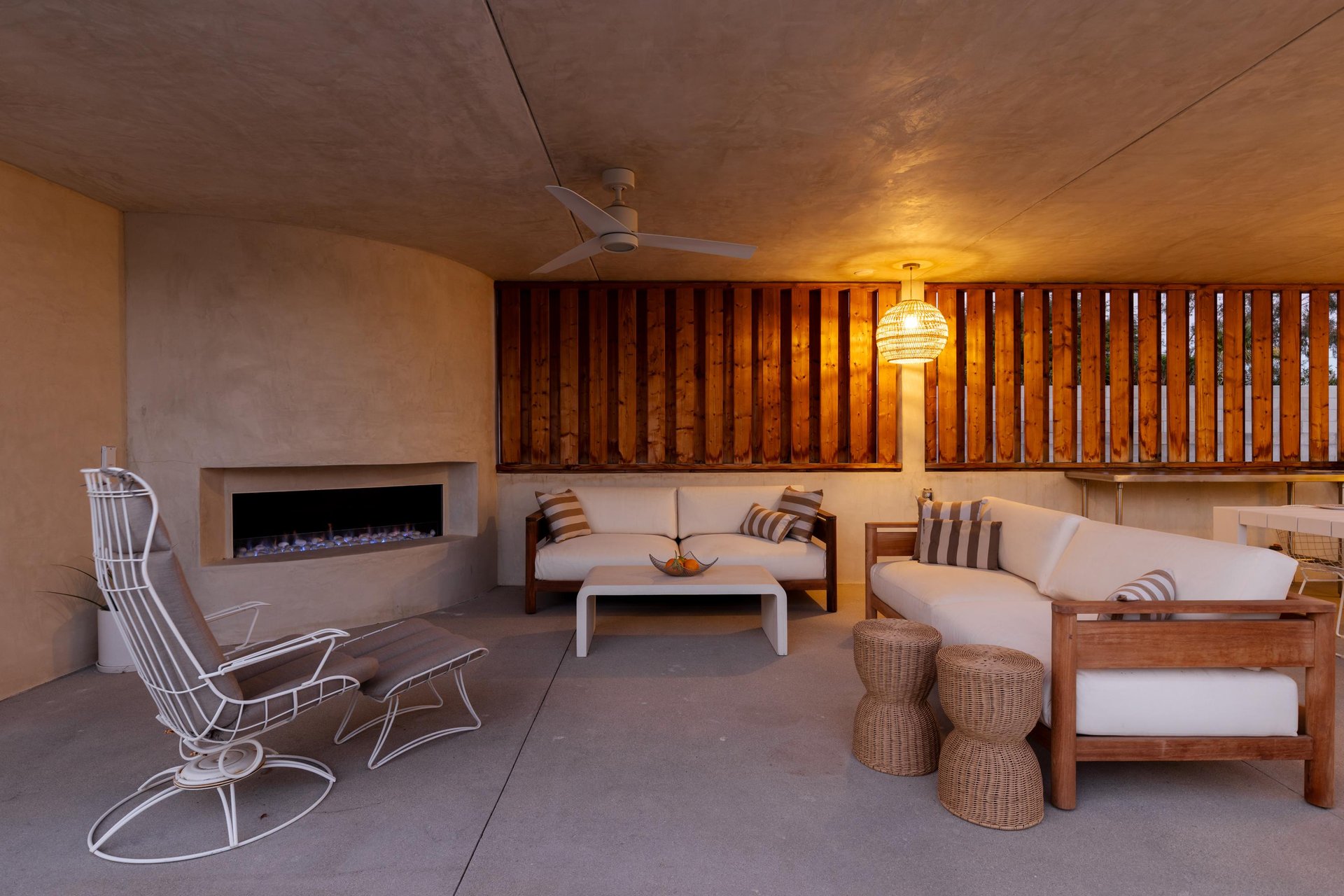 Sophisticated outdoor lounge with fireplace