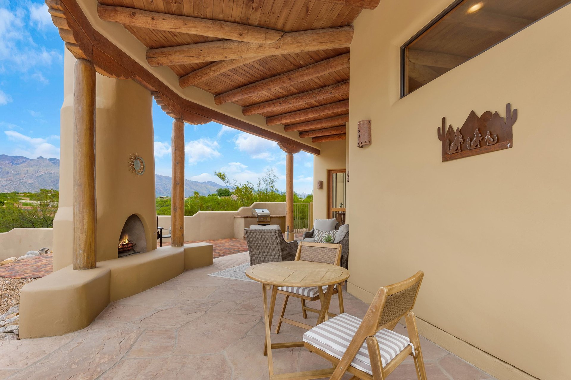 more seating near exterior fireplace