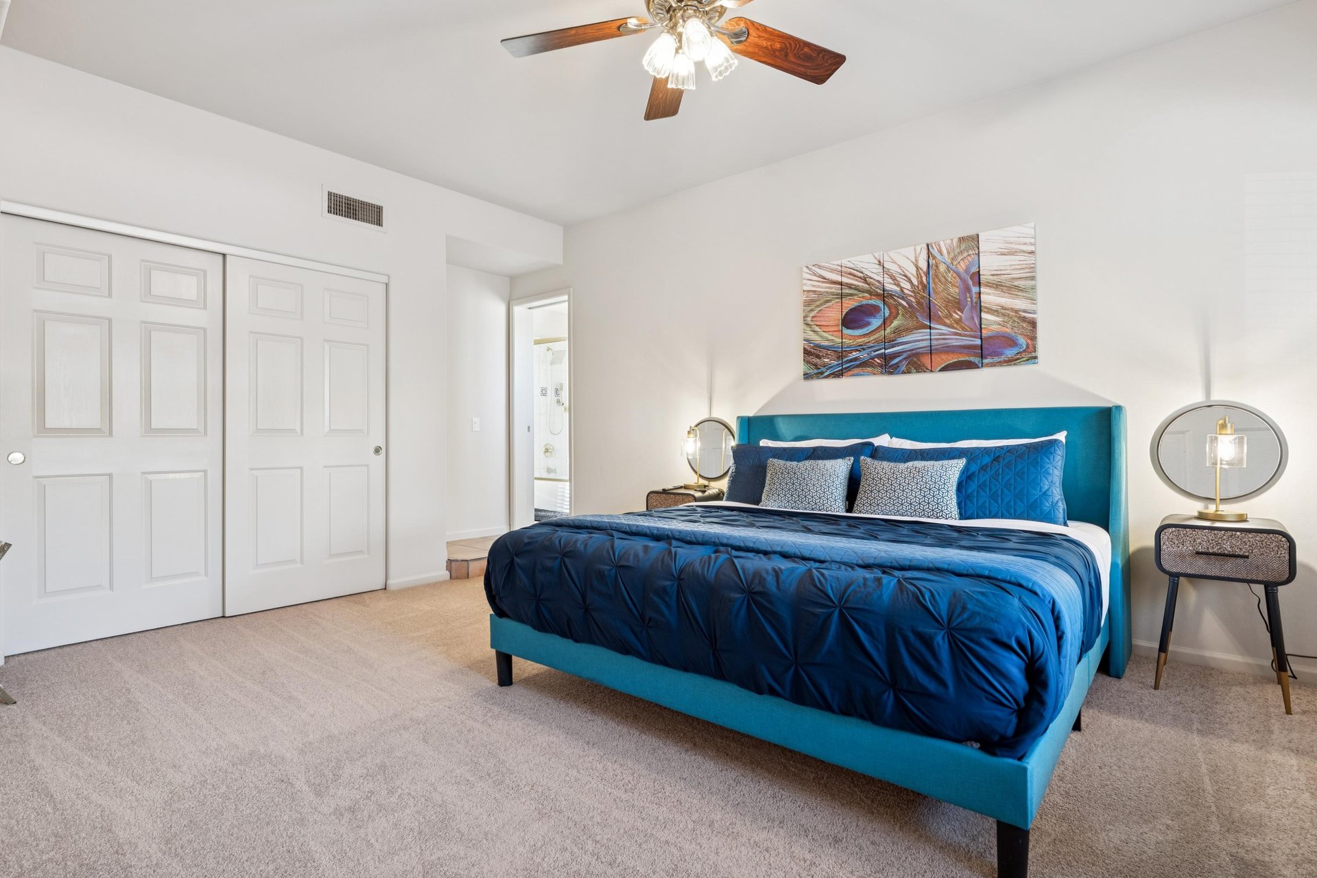 Downstairs guest bedroom with king size bed.