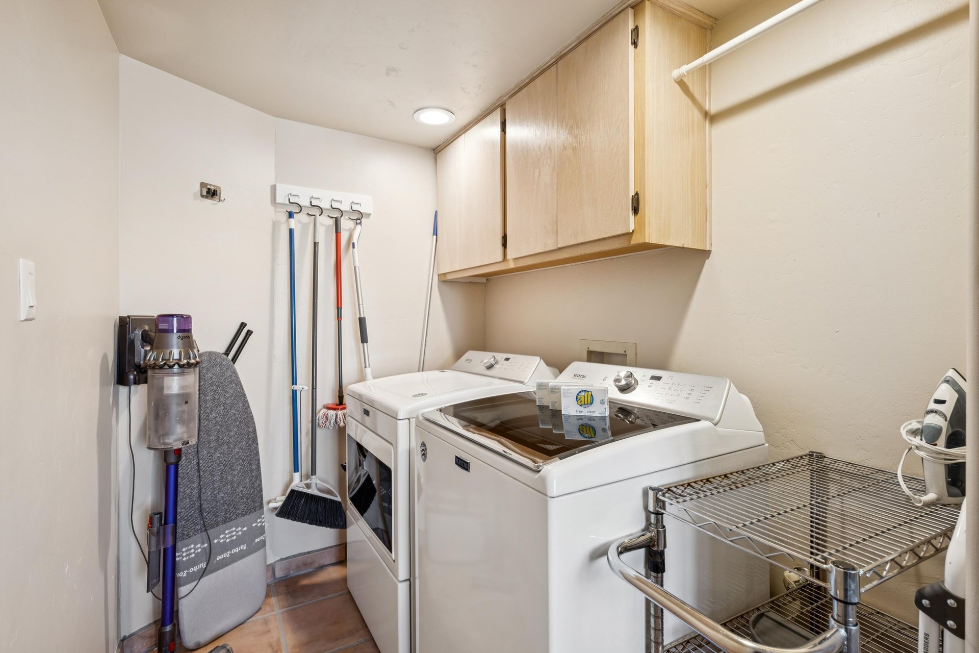 Full size washer  dryer in our downstairs laundry room.