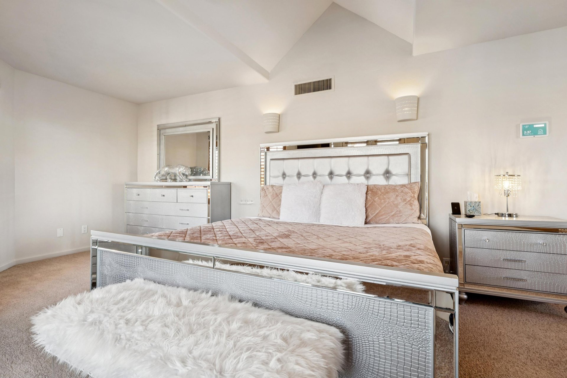 Upstairs primary bedroom with king size bed.