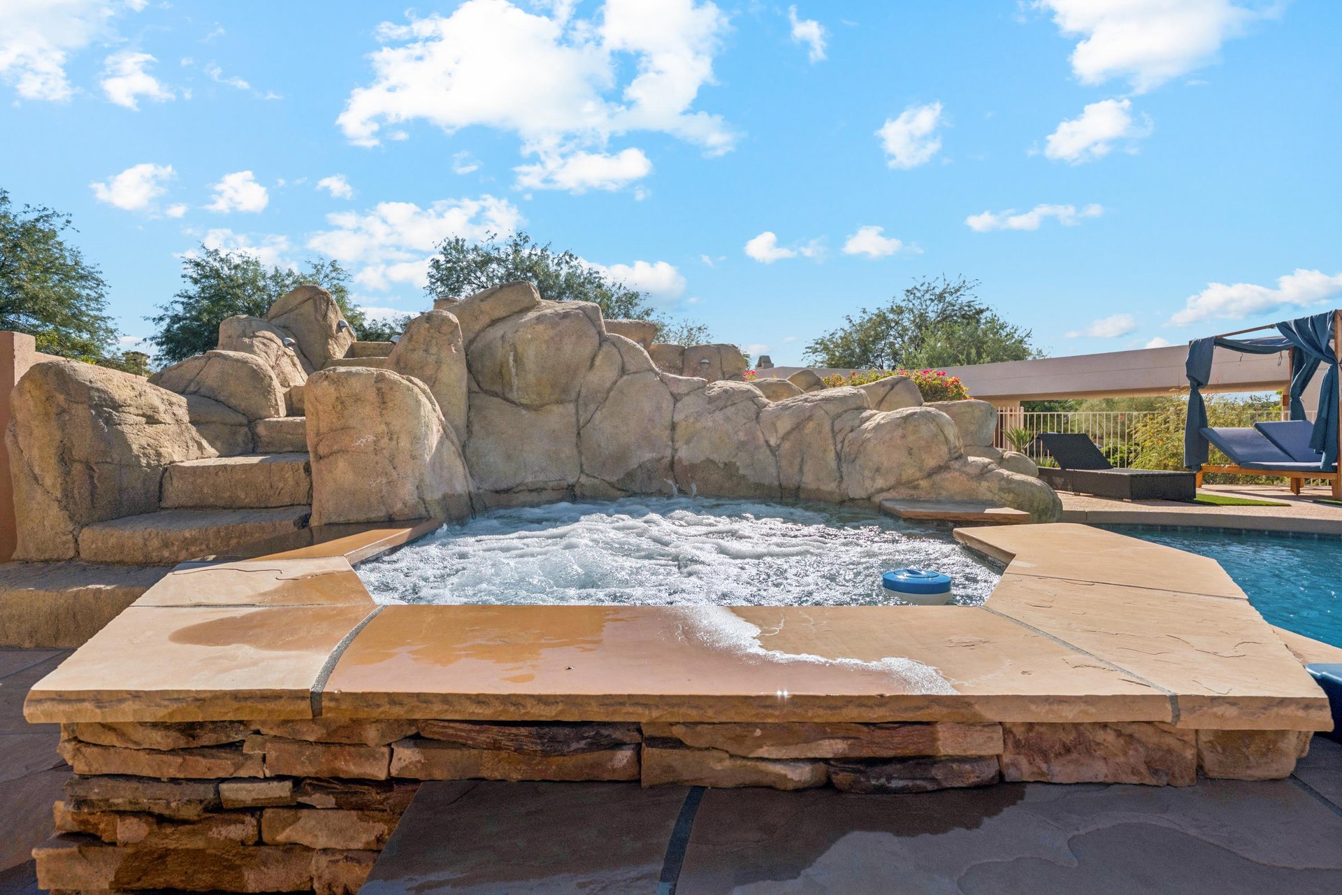 Relax in our spacious outdoor spa.