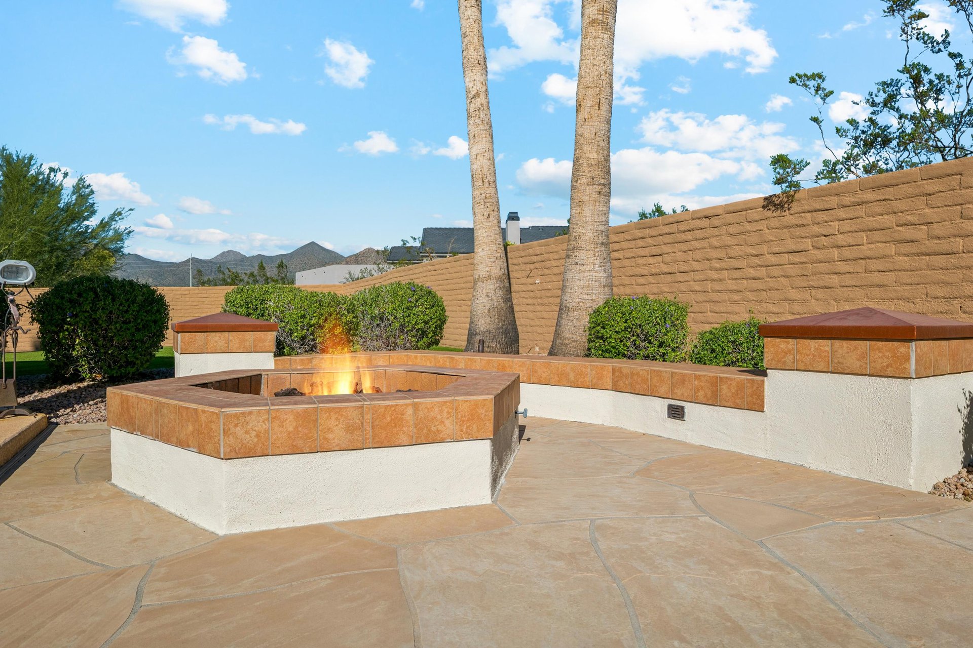 Gas fire pit for outdoor enjoyment.