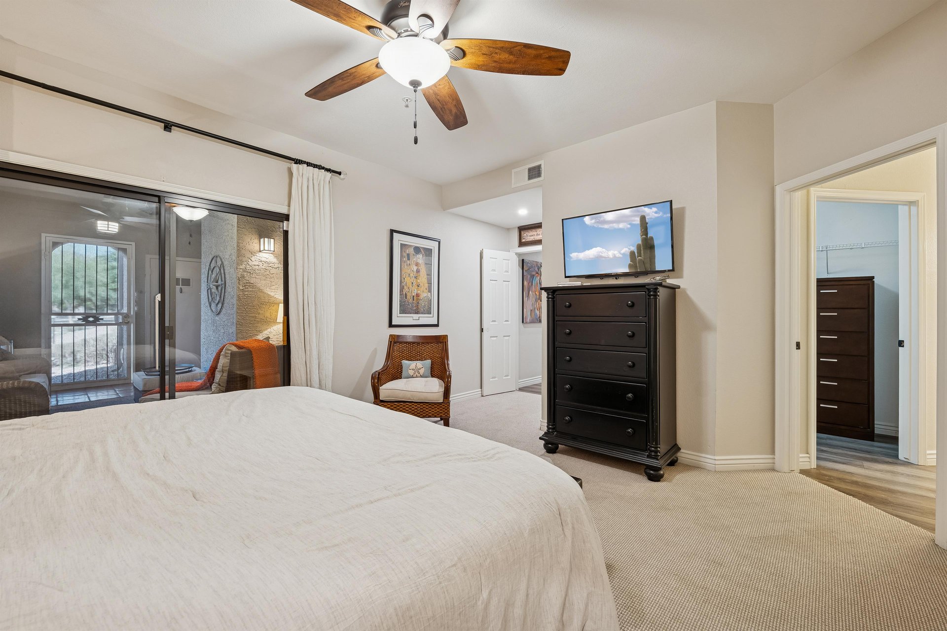 Primary bedroom smart TV for streaming your favorite shows.