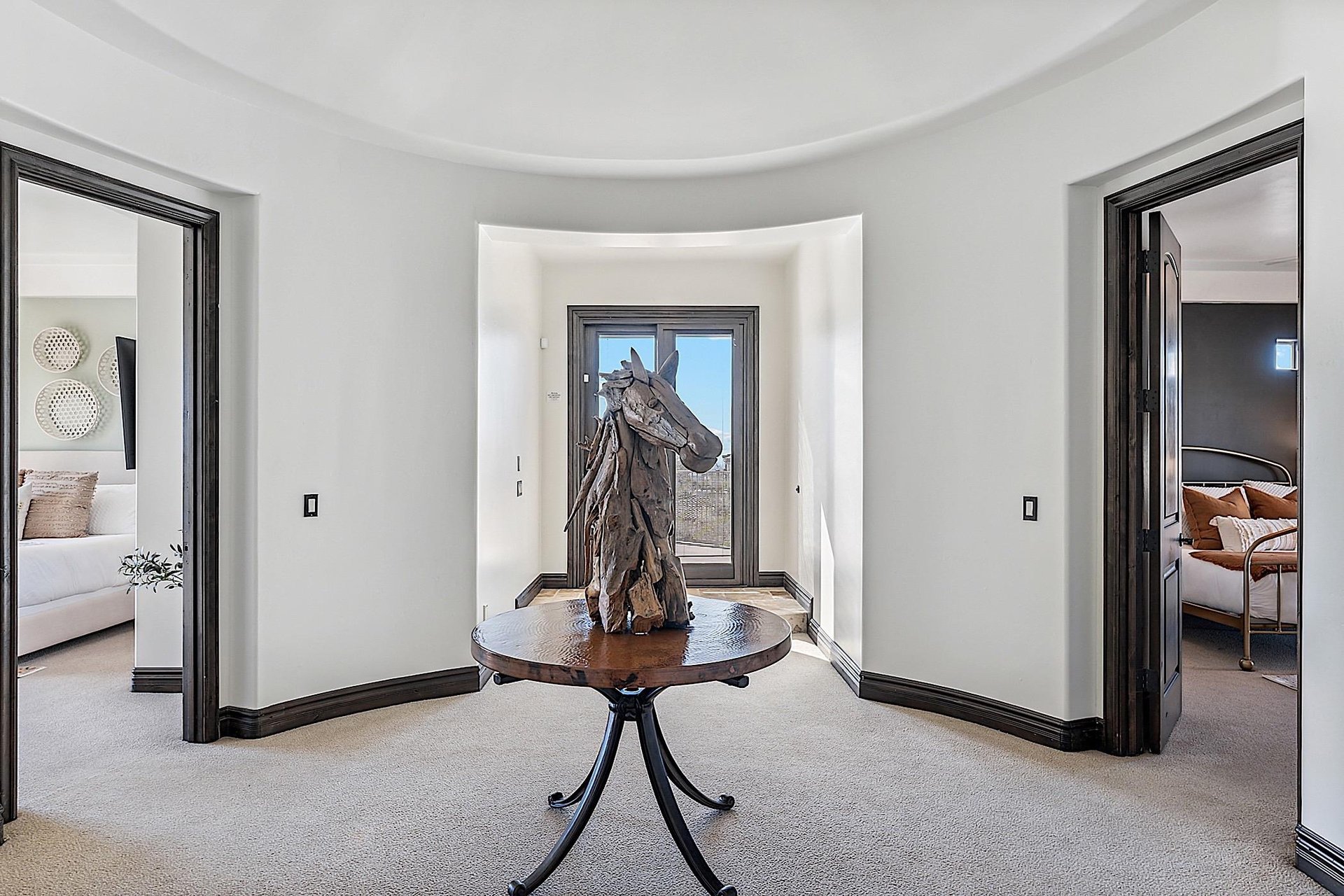 Hallway between bedrooms and to rooftop patio access
