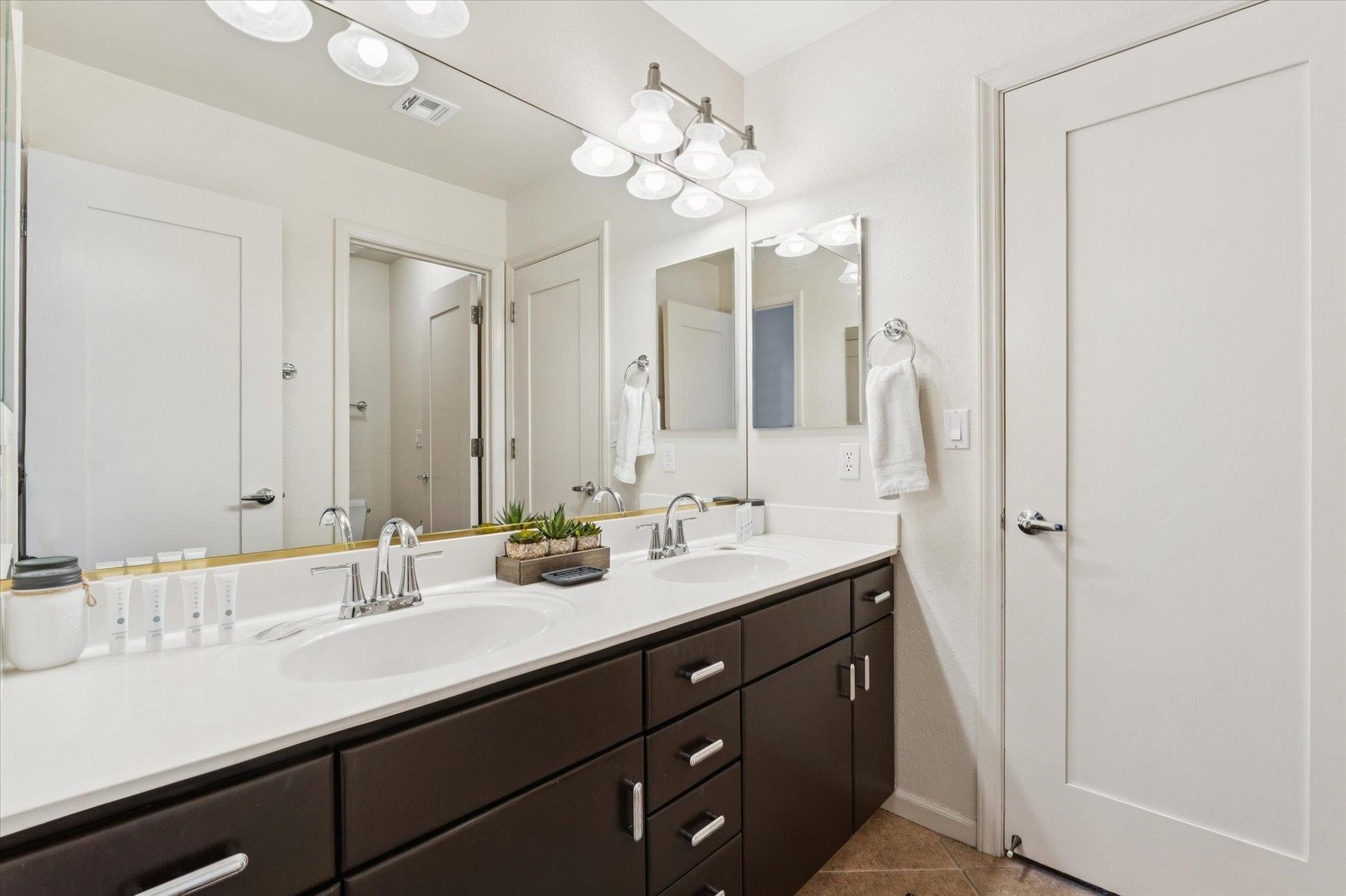 Jack and Jill Bathroom stocked with Starter Supplies