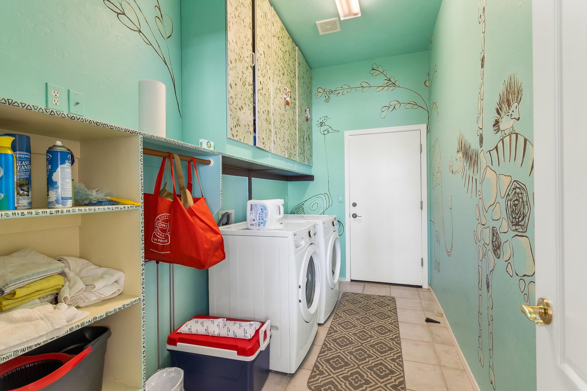 Laundry room with washer and dryer