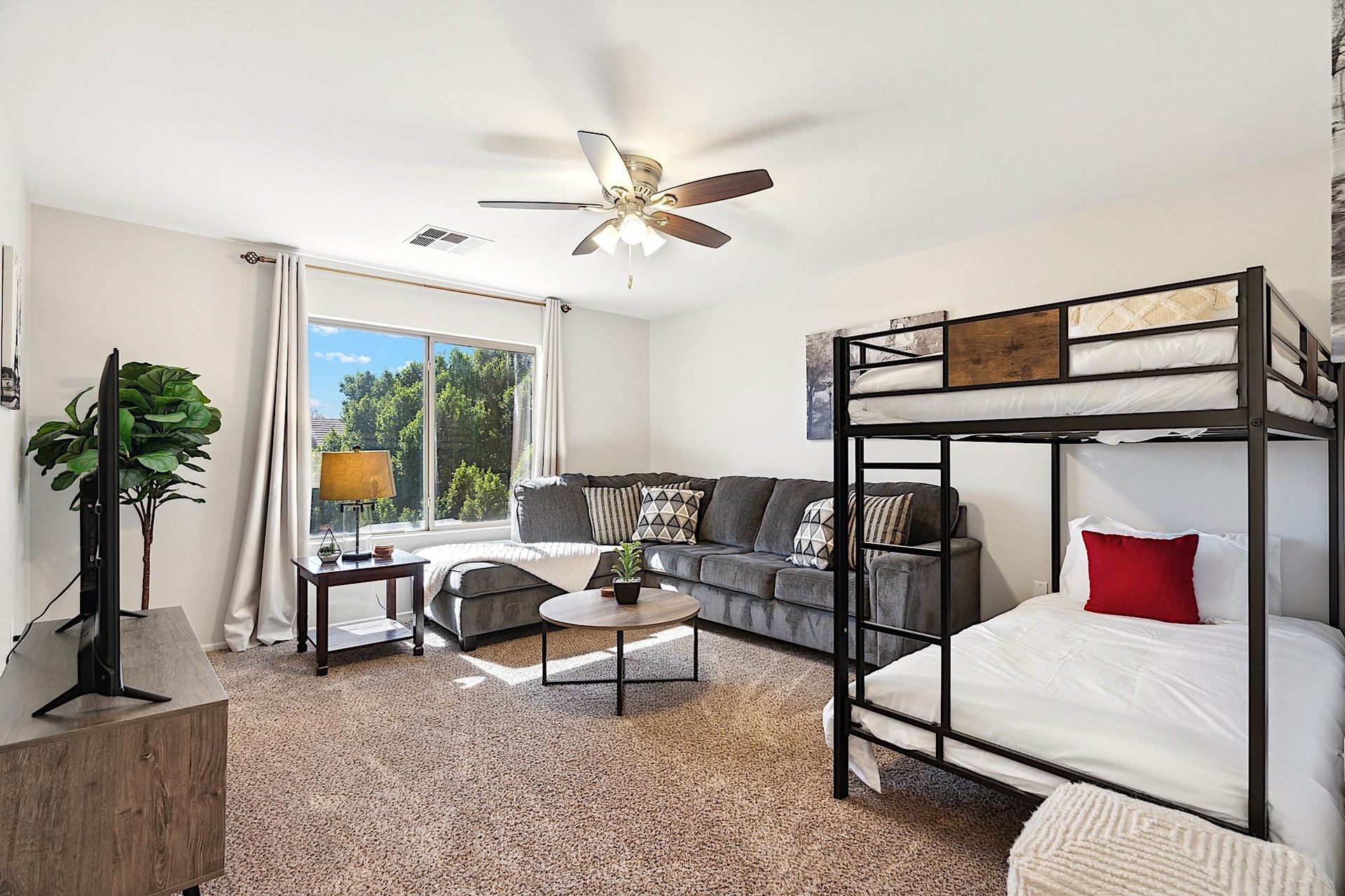 Twin bunkbed, sectional sofa and 55 Smart TV