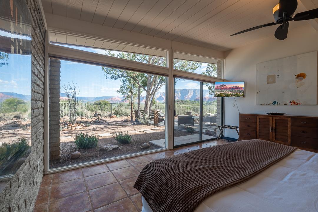 Master Bedroom WIth Wall To Wall Windows