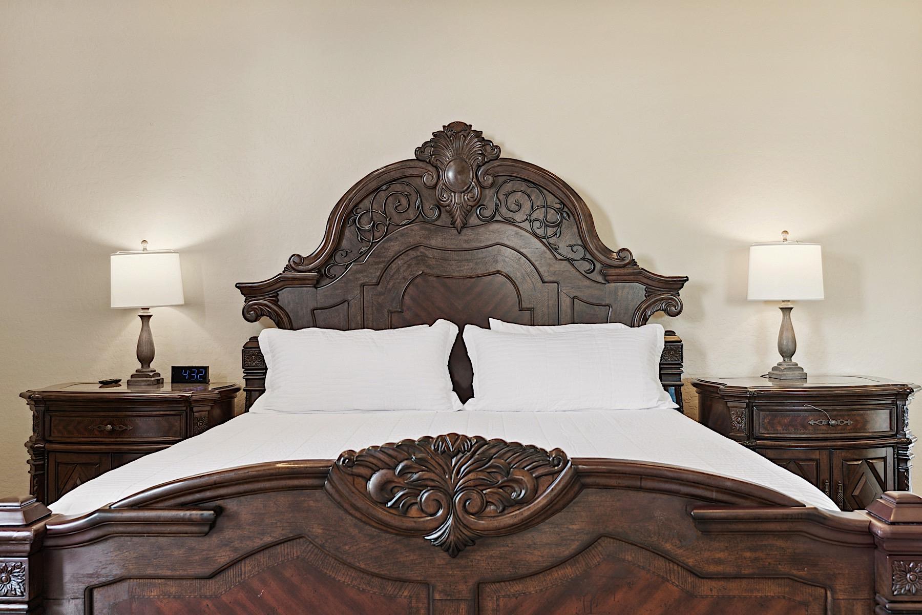 King sized wood carved bed
