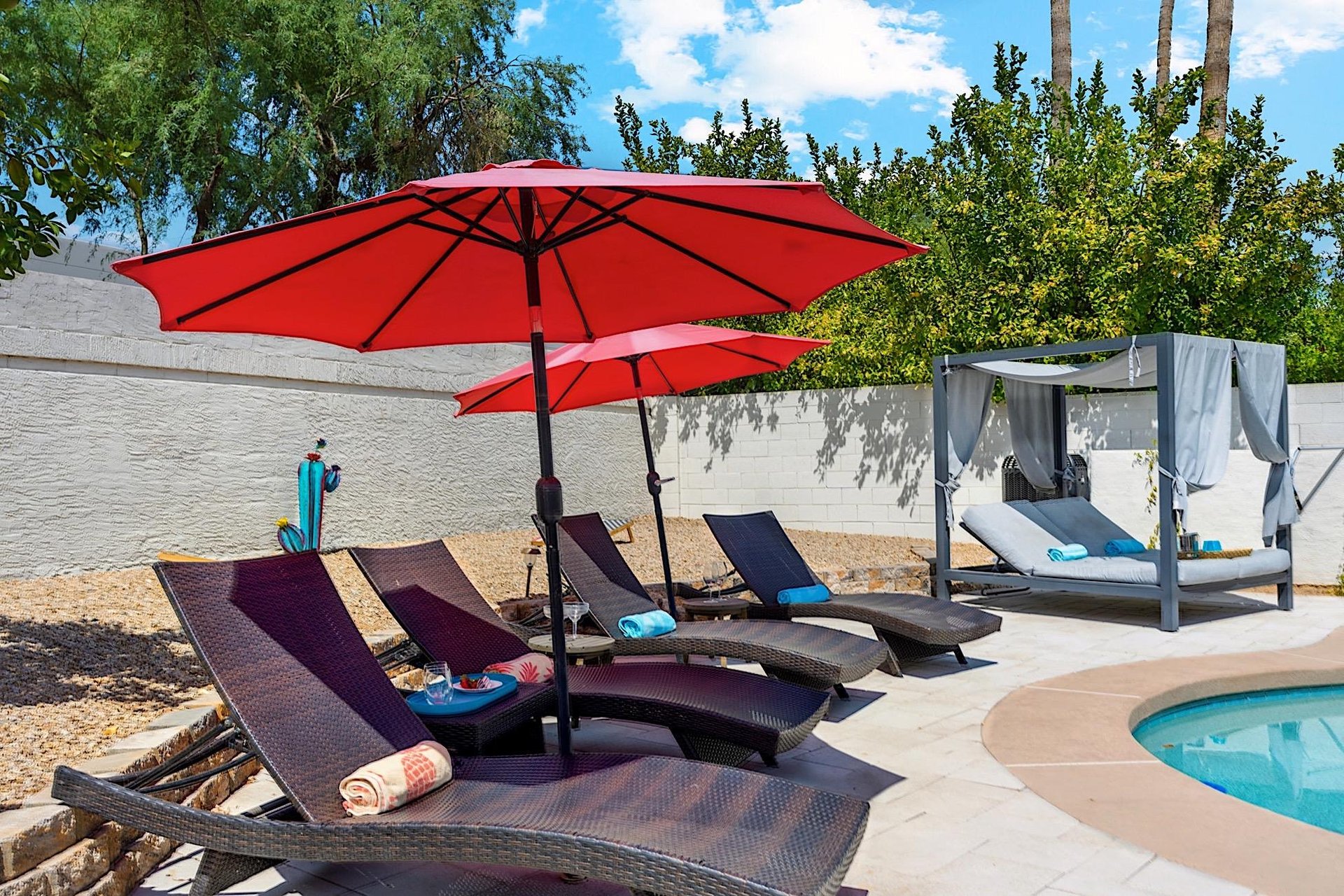 Poolside loungers and cabana