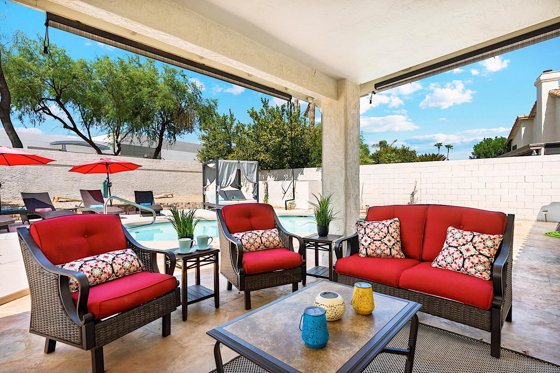 Covered patio  Conversation area w mounted Smart TV