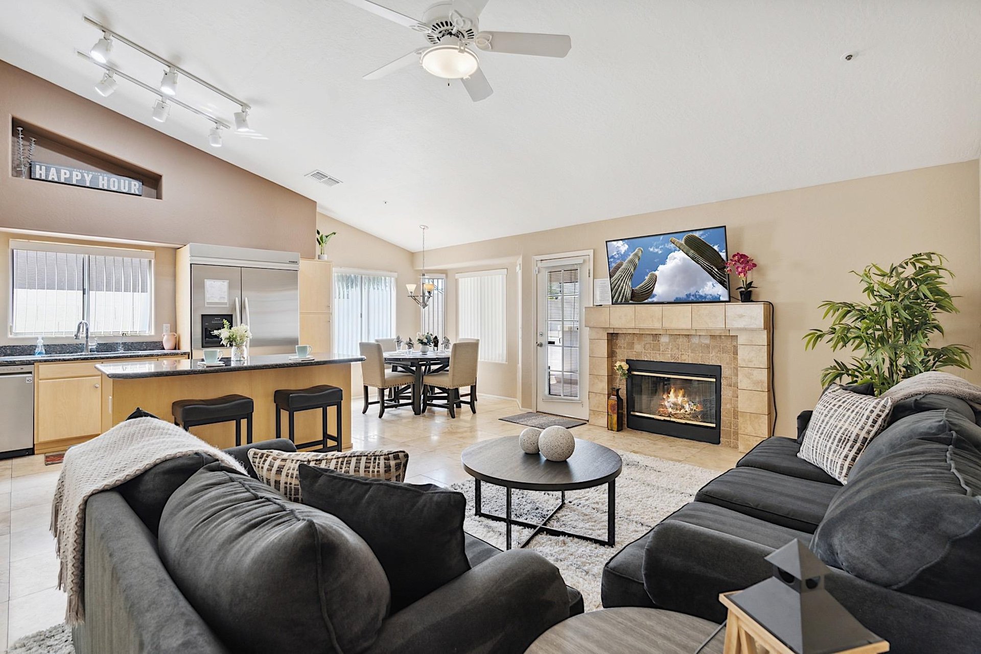 Living room  looking into kitchen and dining area.