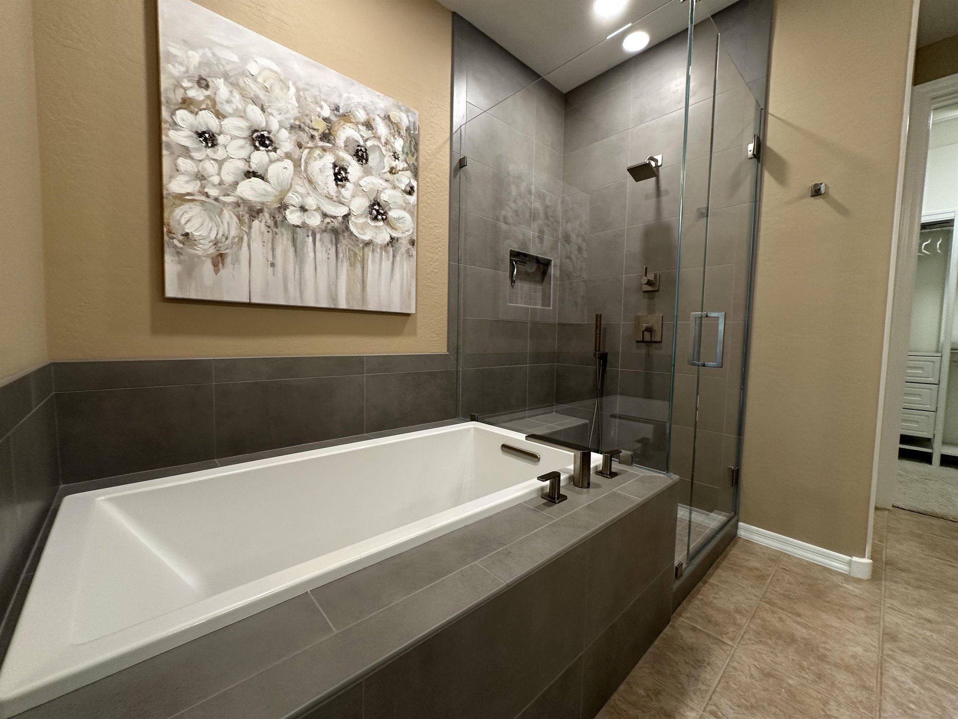 Deep bath tub in master bedroom to enjoy.