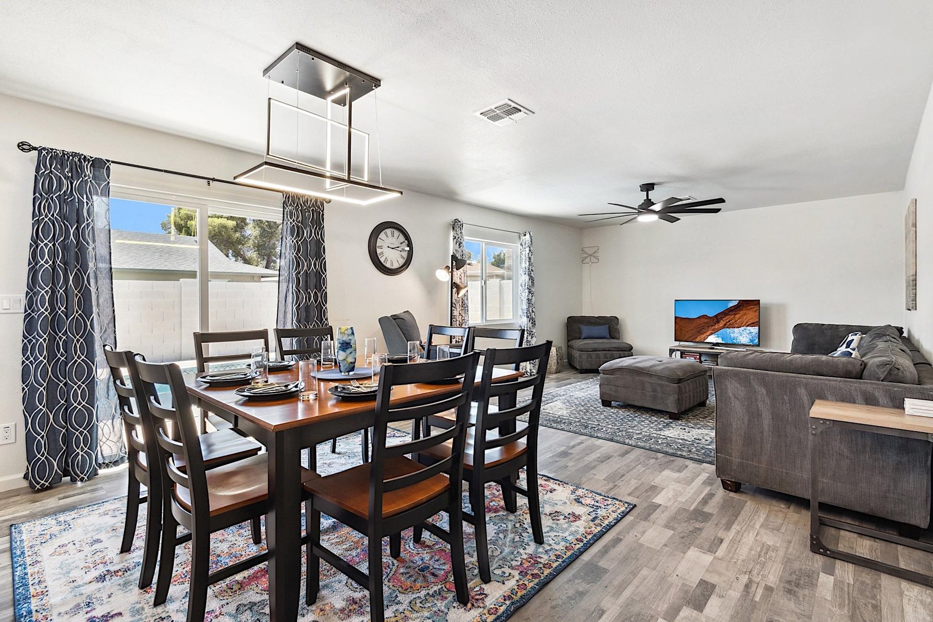 Dining area looking into the living room. Custom chandelier