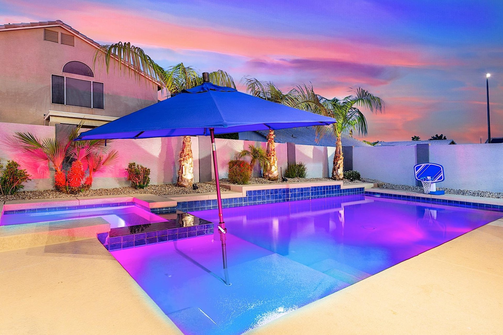 Pool lit up at night.