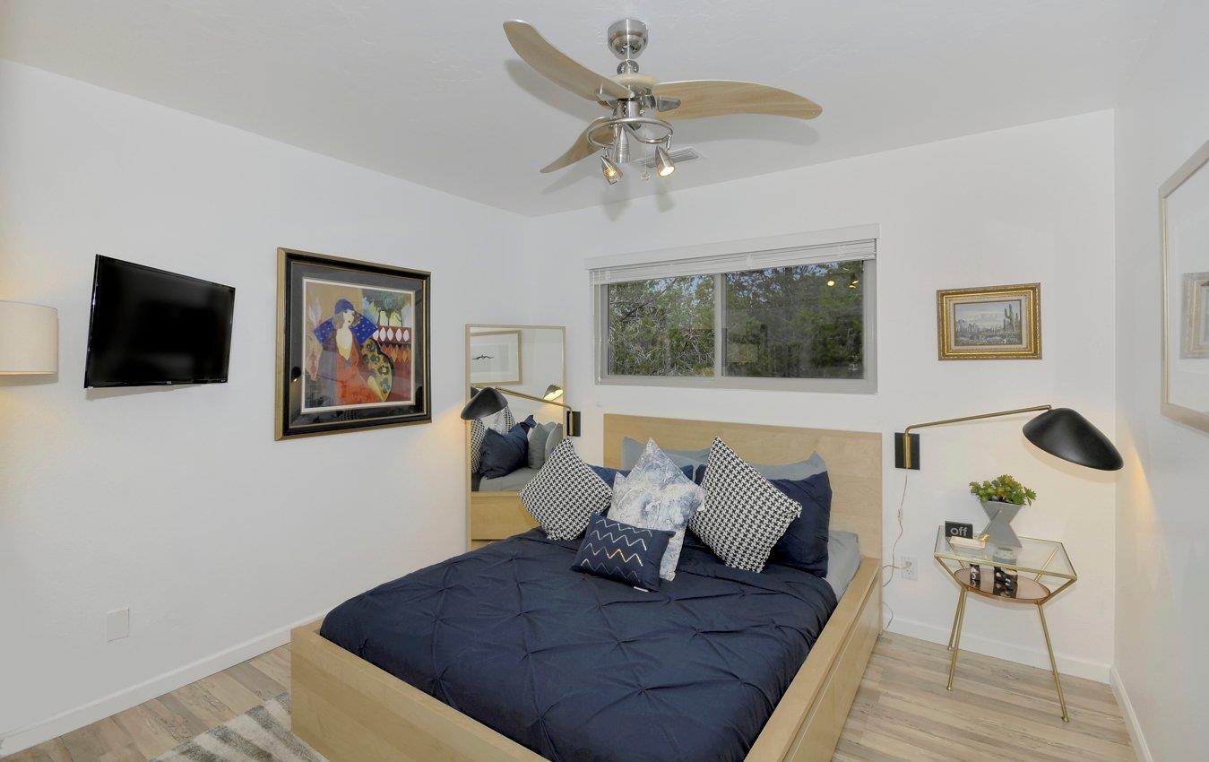Guest bedroom with TV