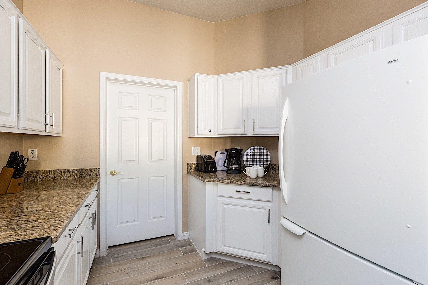 Kitchen leads to laundry room.  Look at the little coffee nook