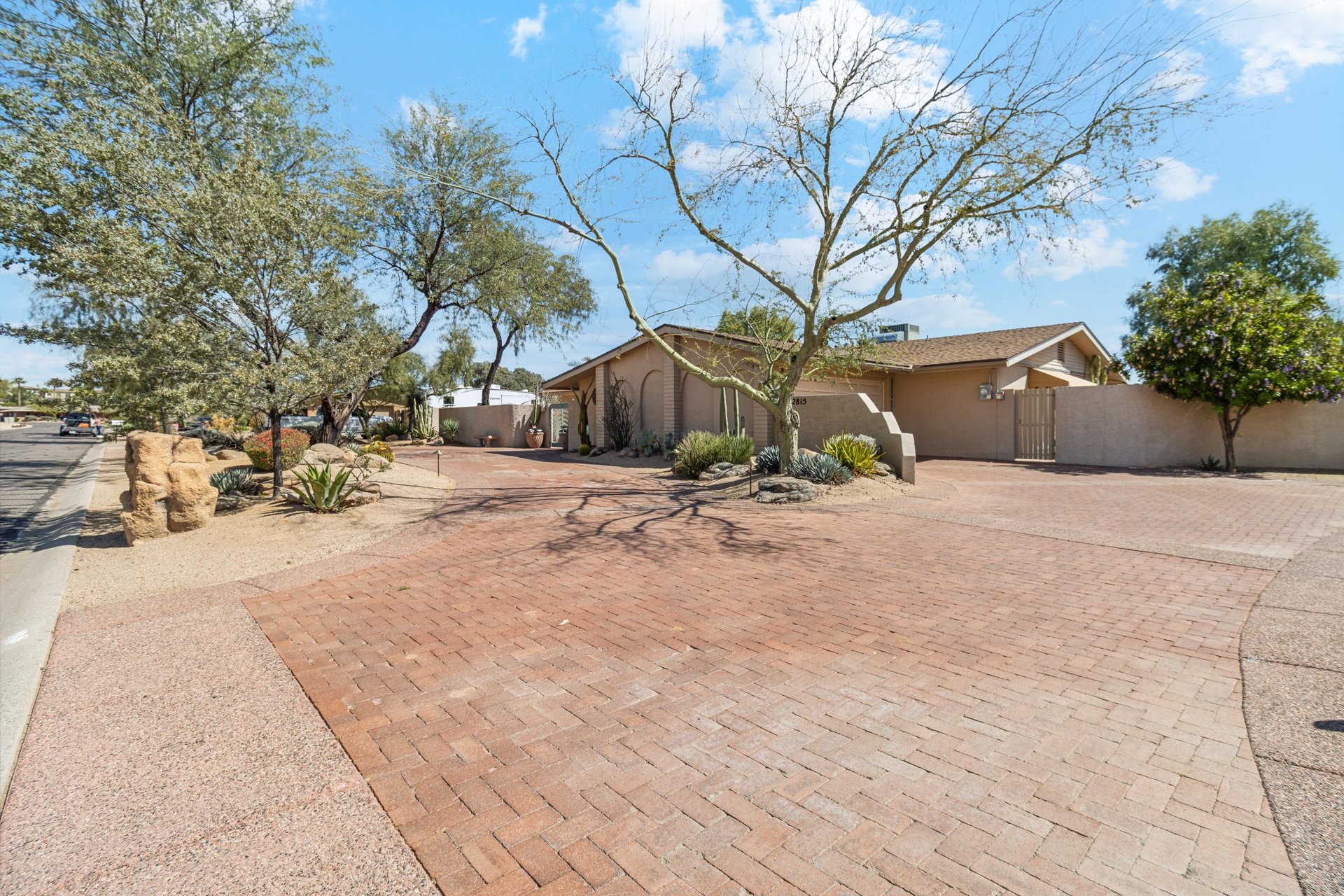 Large driveway provides open guest parking for whatever you feel is most convenient.