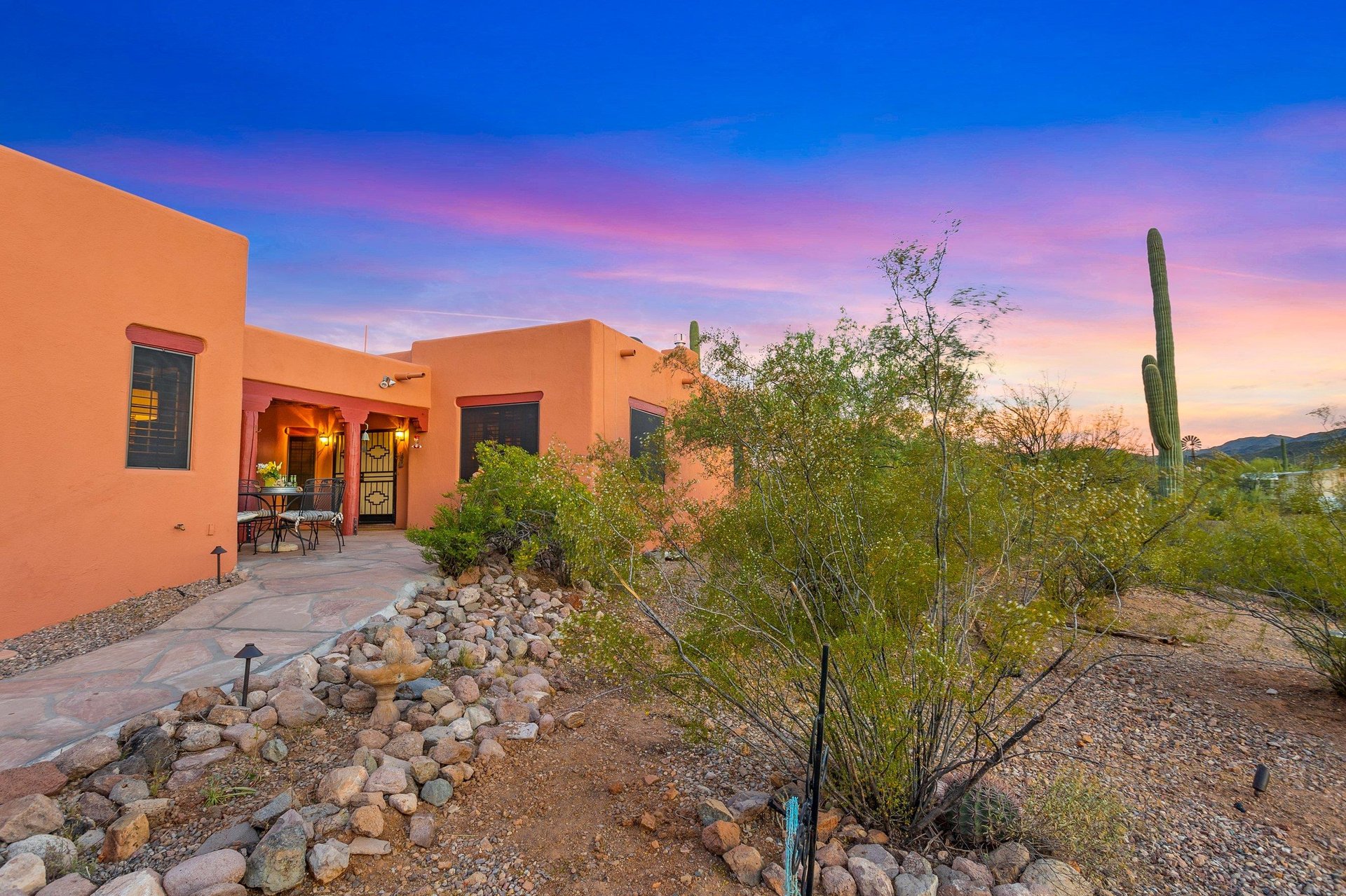 View of back of home and patio