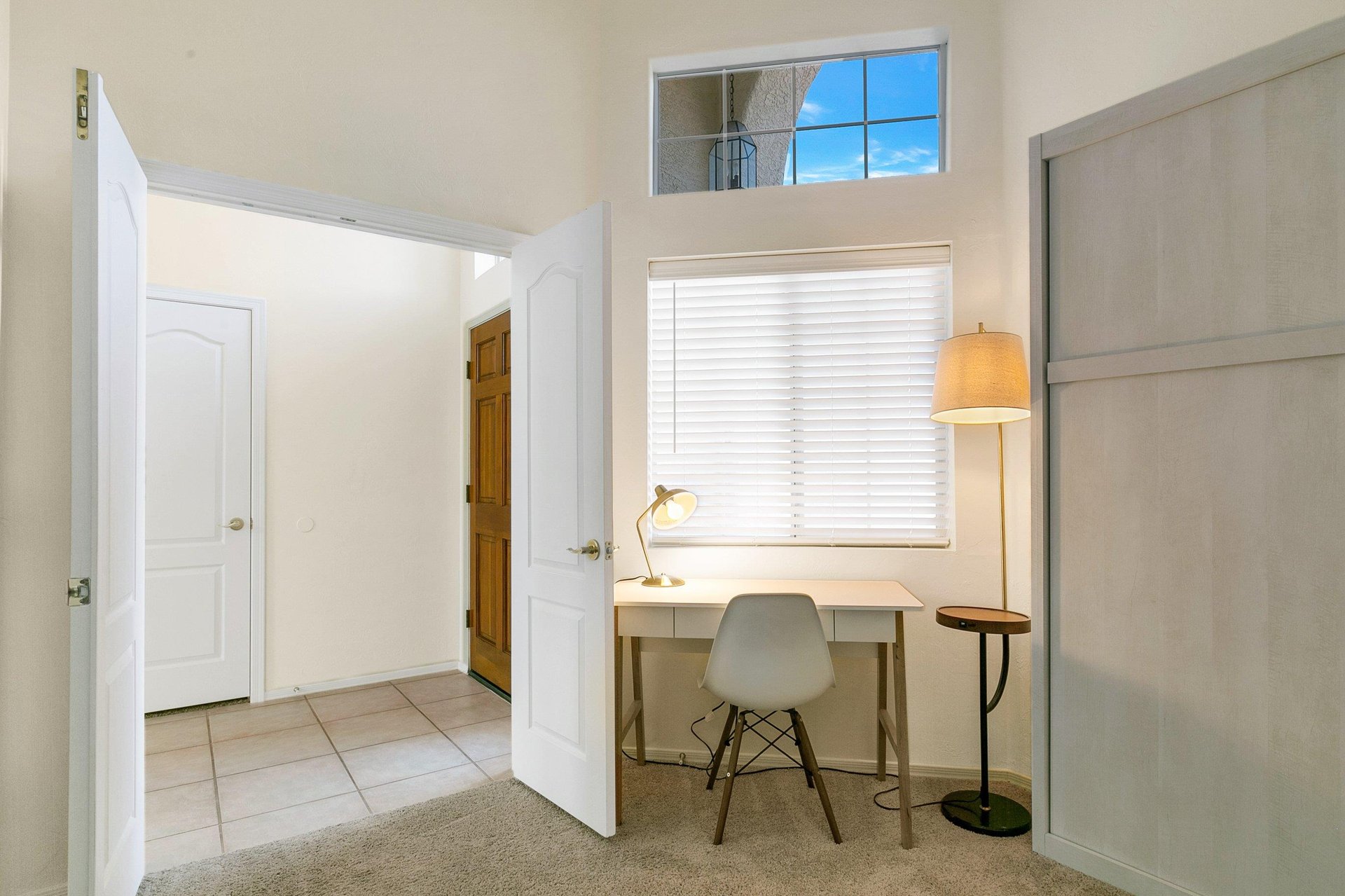 Den with workstation and Murphy bed