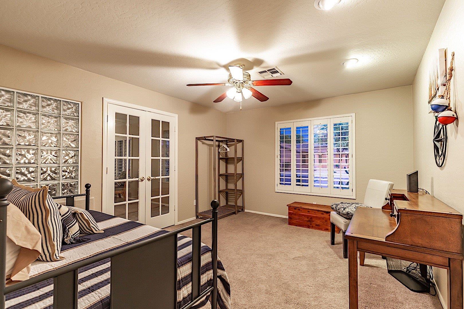 Office area with desk and trundle bed