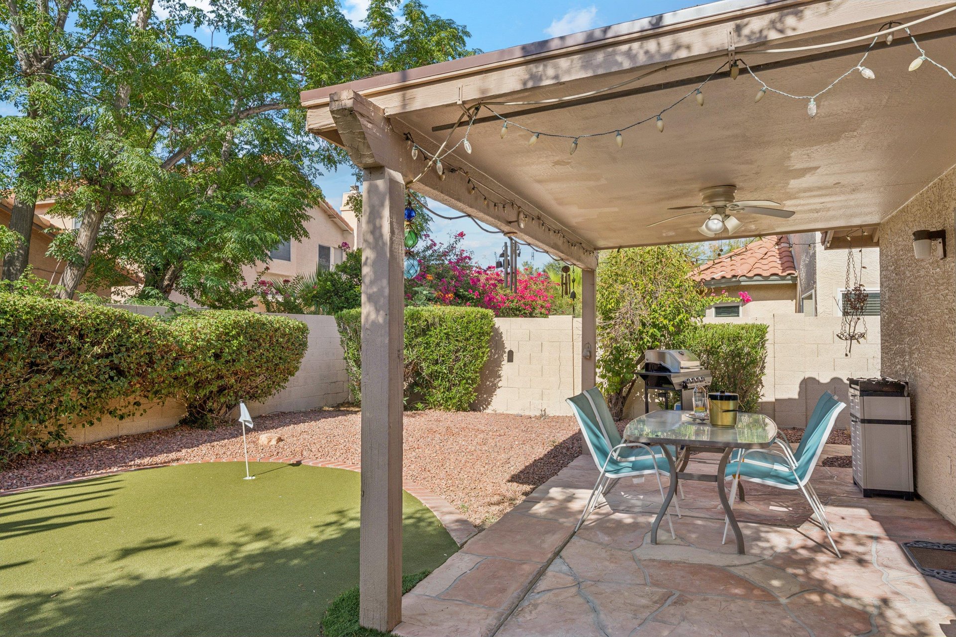 Enjoy daytime comfort with the mister system or unwind under cozy string lights that create the perfect nighttime ambiance