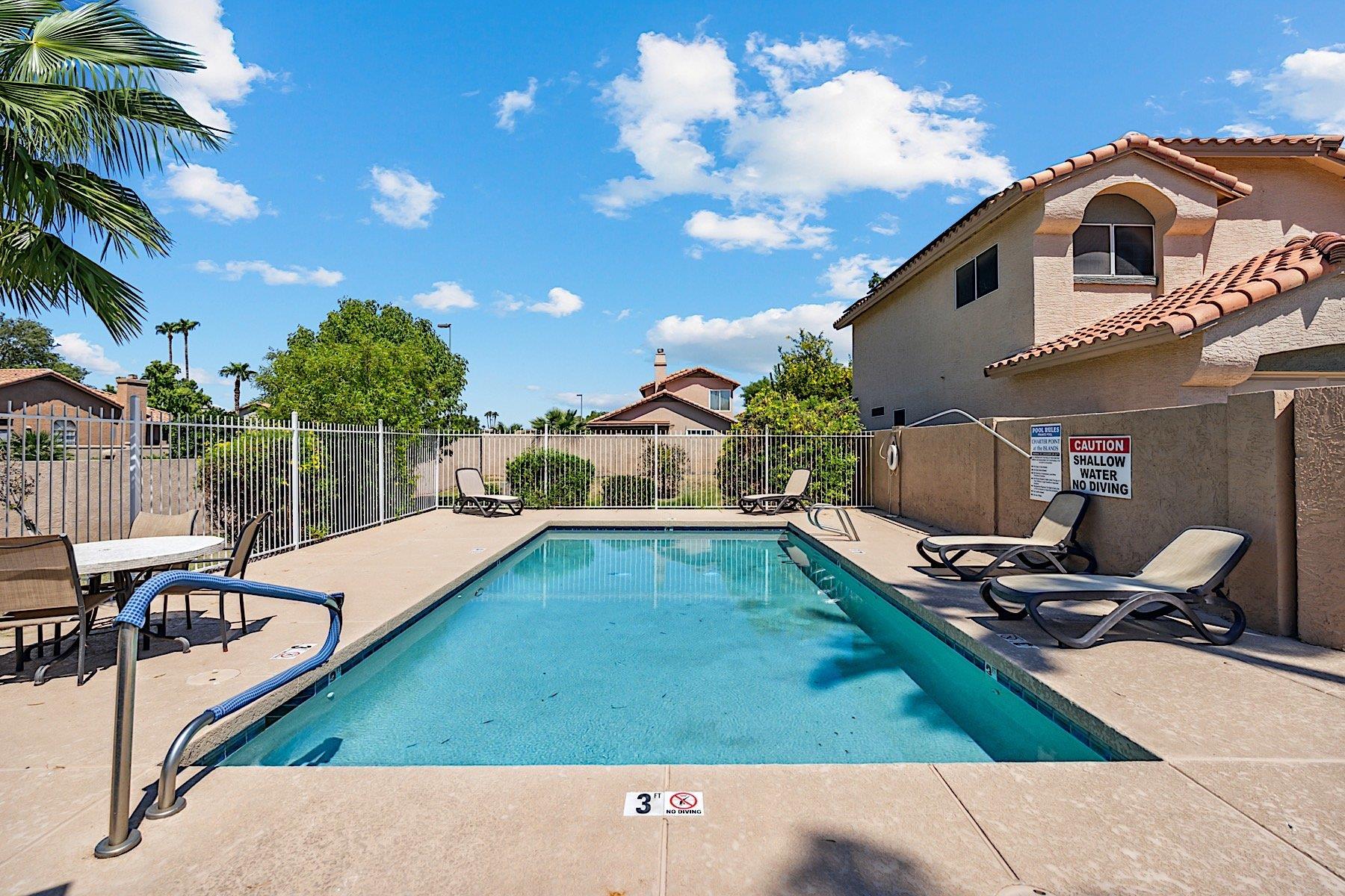 Community pool conveniently located steps away from the home