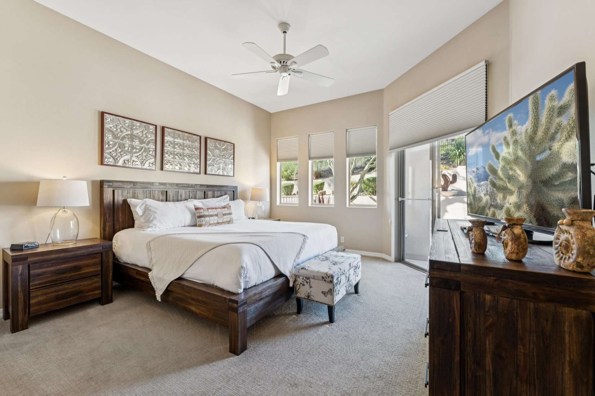 Retreat to a luxurious king bed with direct access to your private backyard oasis