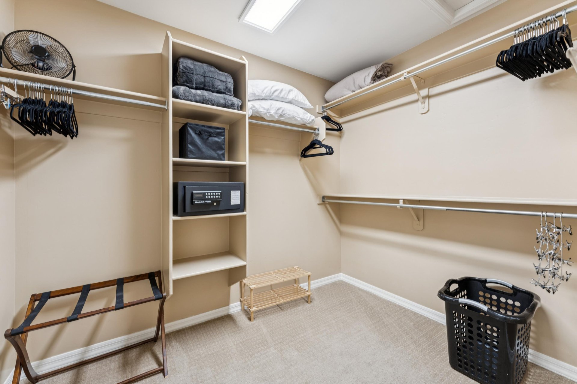 Enjoy a roomy walkin closet and secure safe in the main bedroom for stressfree travel