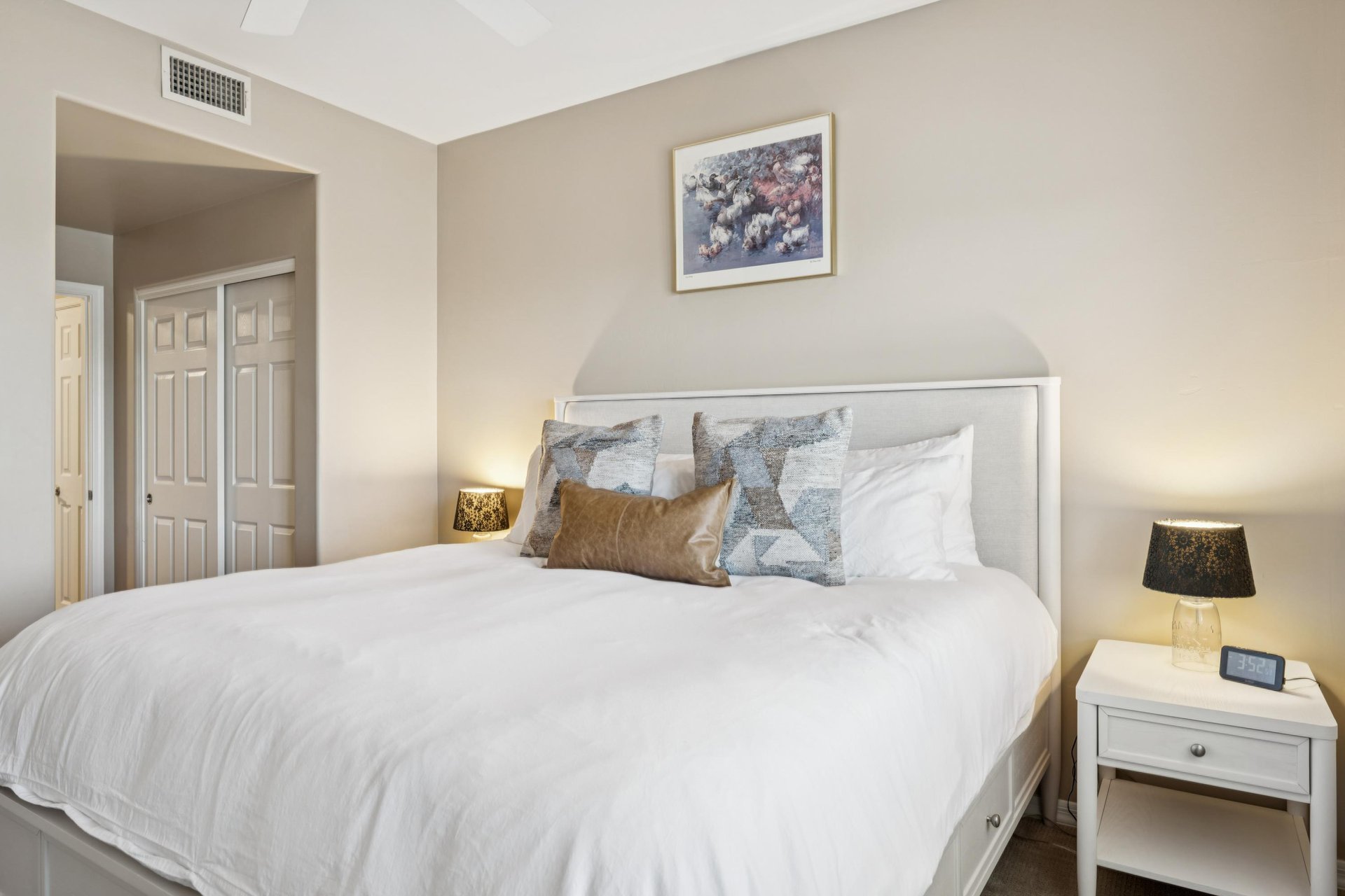 Bright and delicate second guest room, decorated with flowers and playful duck touches