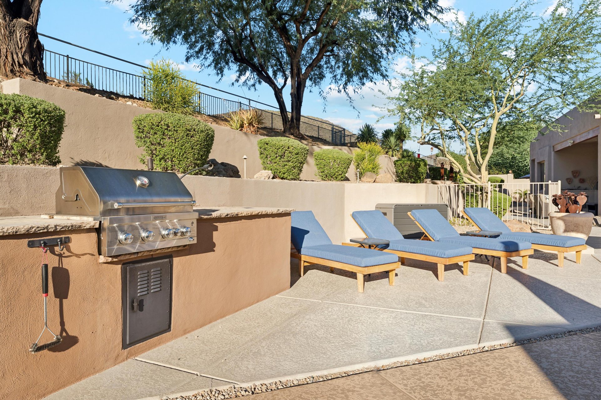 Relax, grill, and lounge  poolside comfort