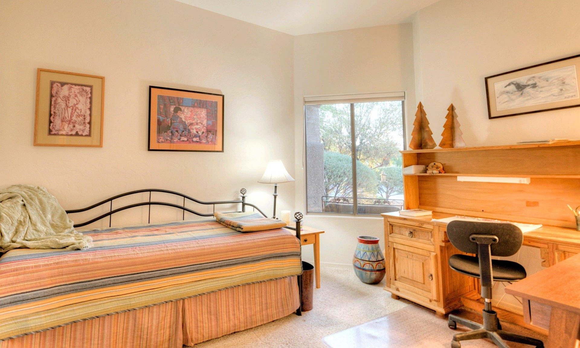 Guest bedroom two with captains style twin day bed Two twins and office area