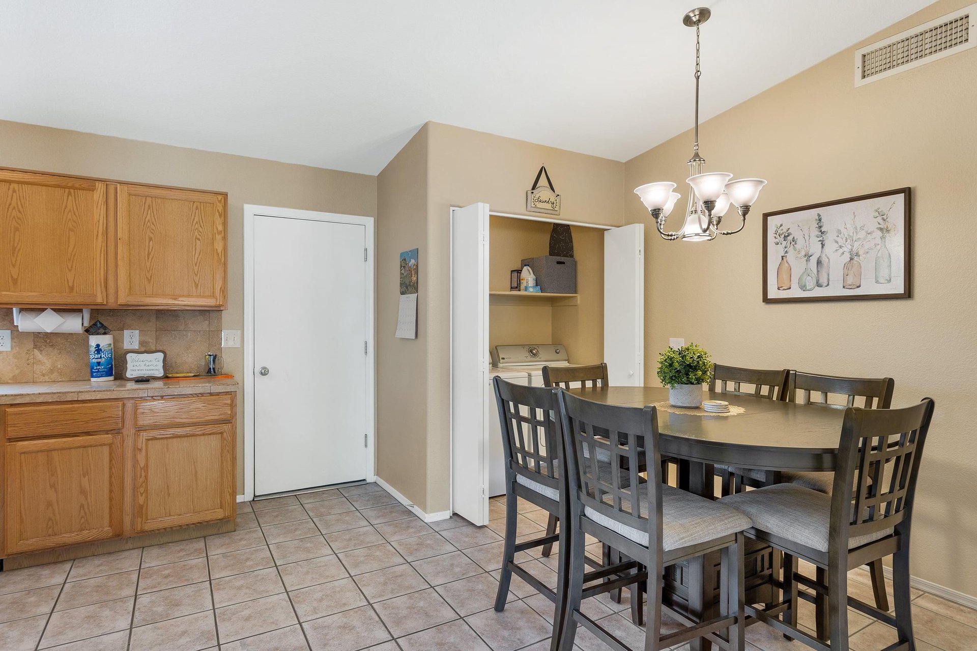Dining Area to Kitchen Laundry in the closet