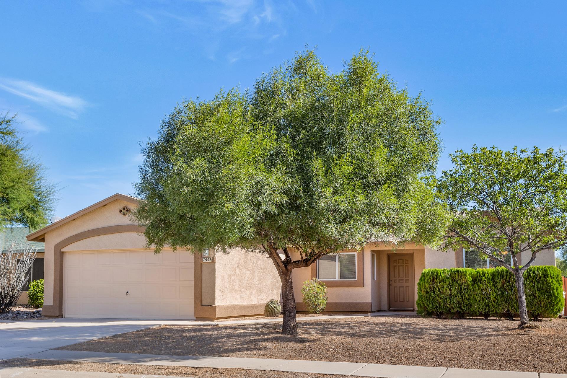 The front of the home has great vegetation and landscaping done monthly