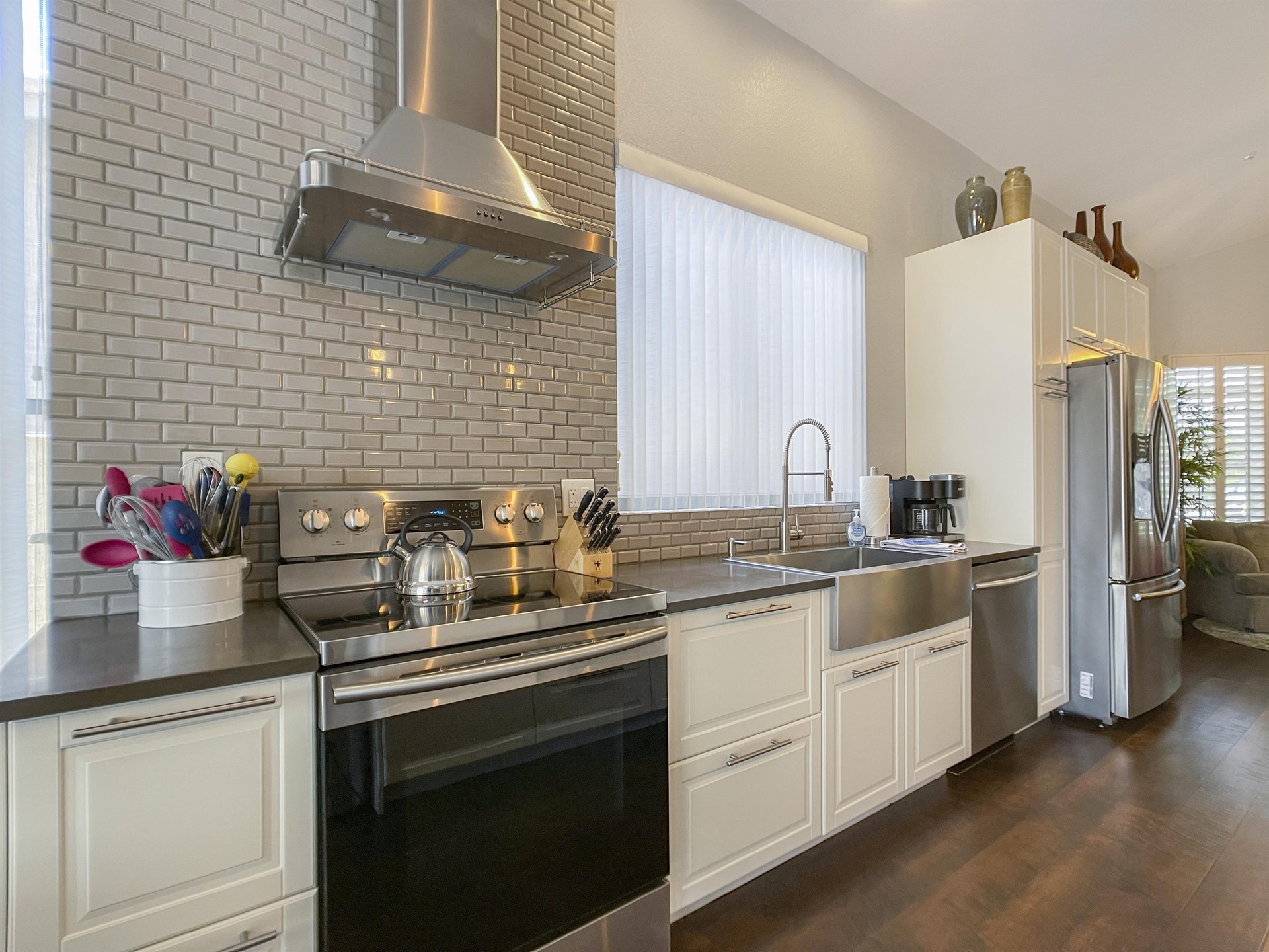 Kitchen as seen from the dining room table.