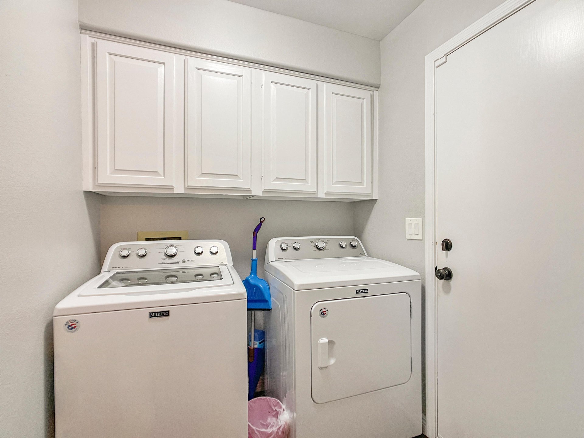 Washer and dryer on main floor across from main suite.