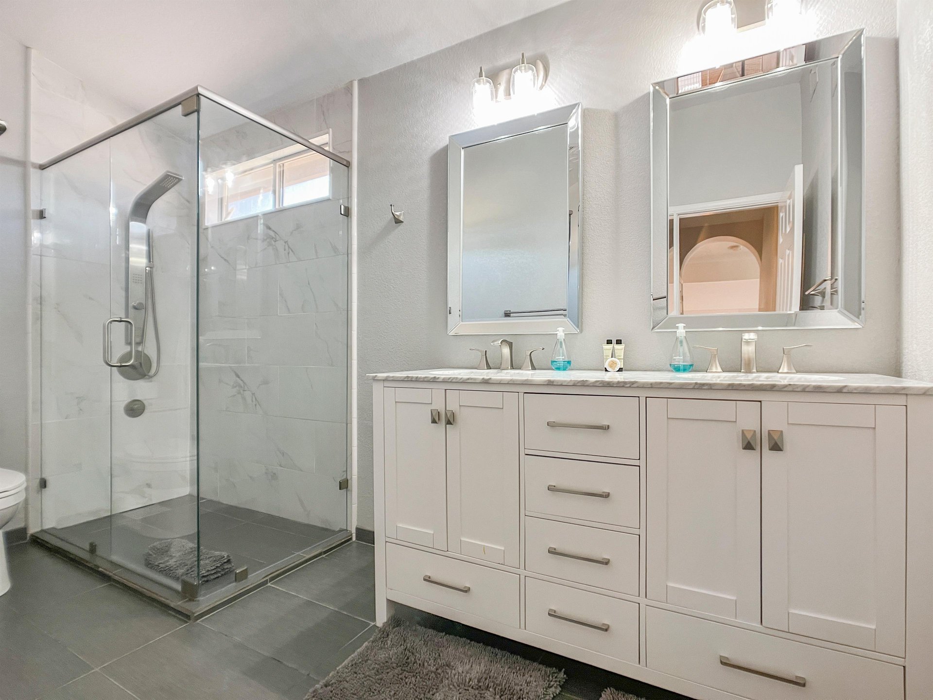 This bath is located upstairs near the study loft and two  of three bedrooms.