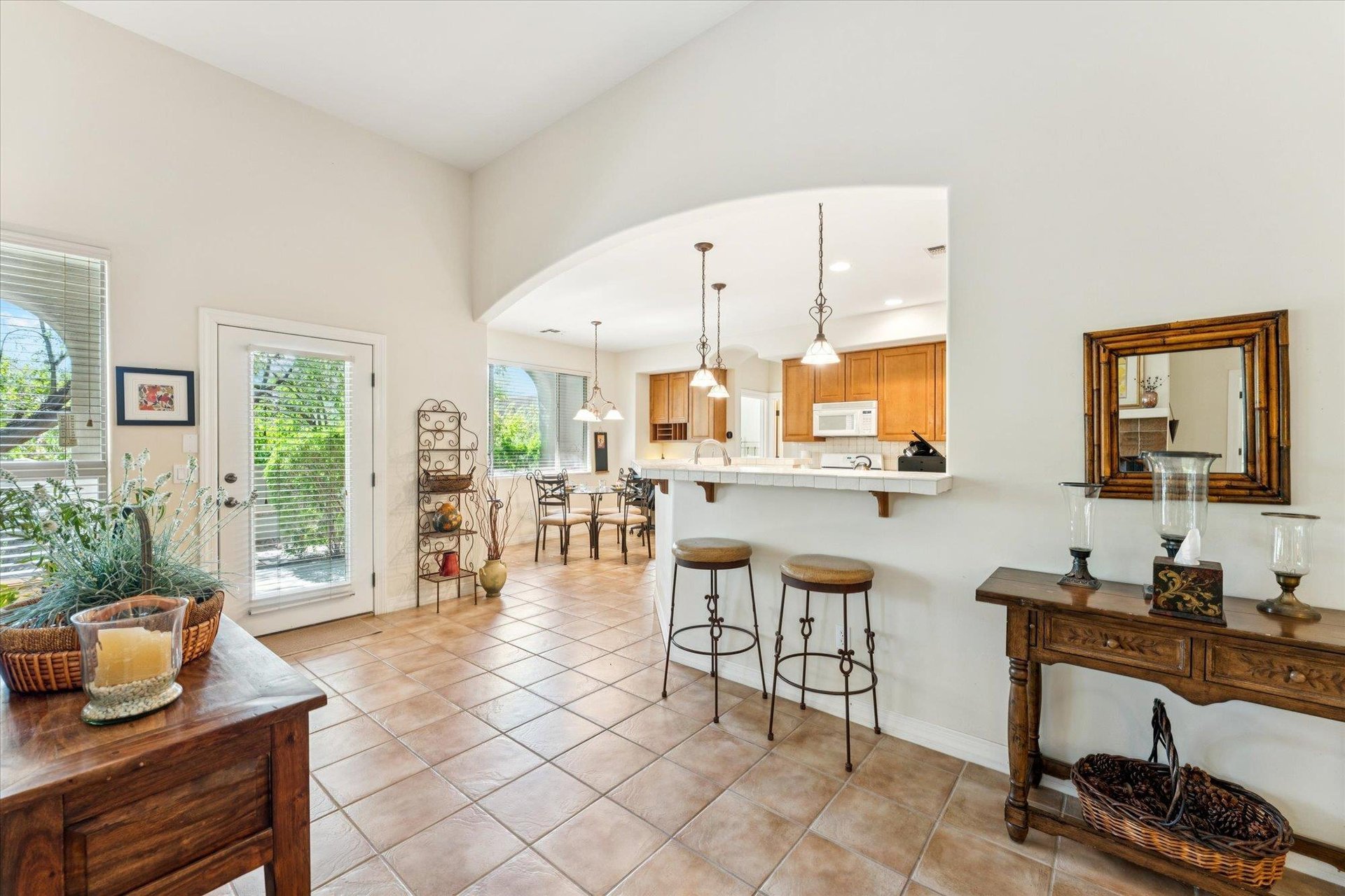 Keep the chef company at the bar stools looking into the kitchen
