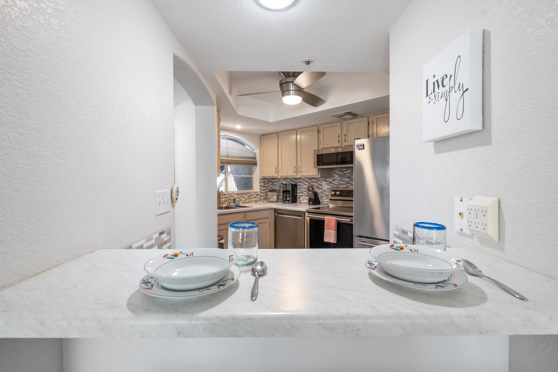 Enjoy breakfast for 2 at the countertop dining area.